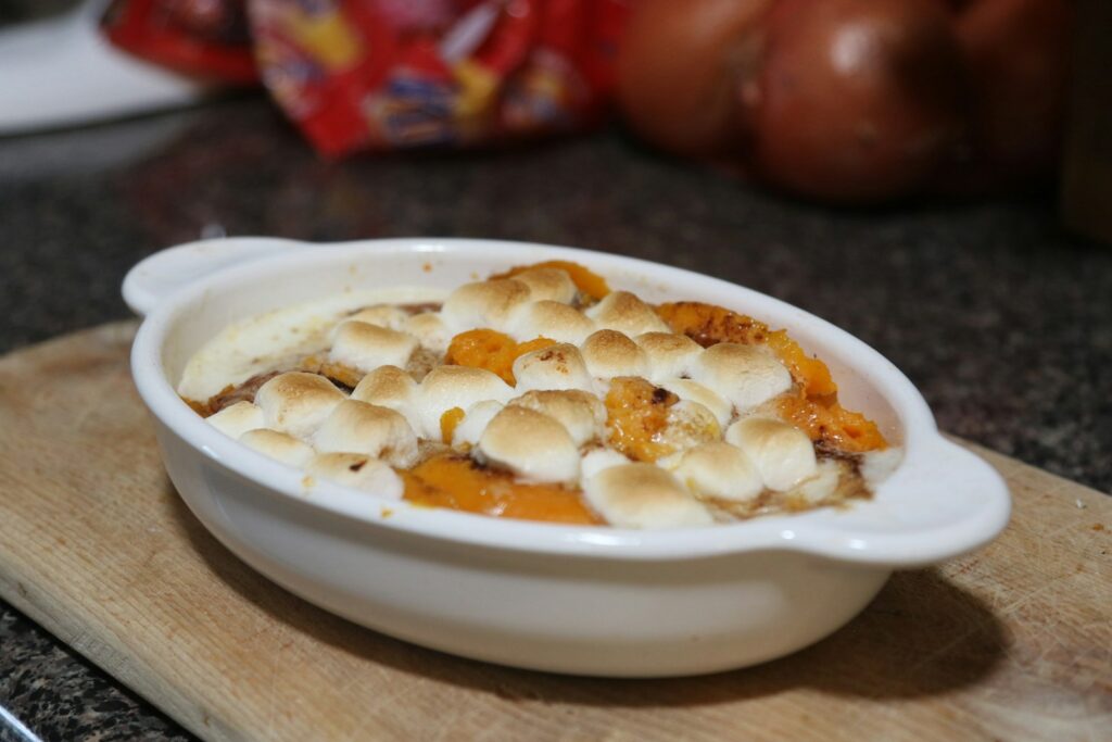a bowl of food on a cutting board